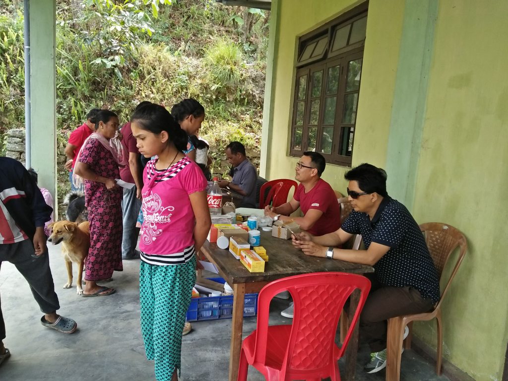 The Govt.Veterinary distributing free medicine and Shelter staff, Mahesh issuing Vaccine health cards